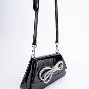 Public Desire Black Patent Mini Crossbody with Crystal Bow